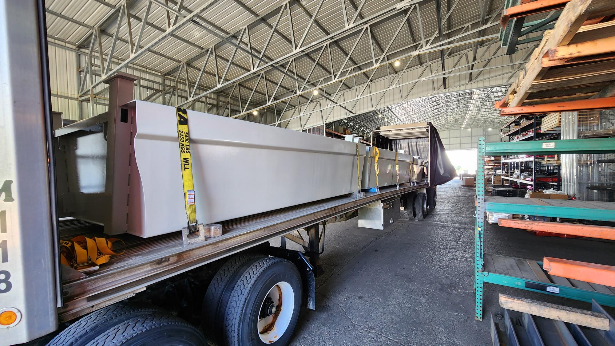 Large fabricated parts loaded for delivery